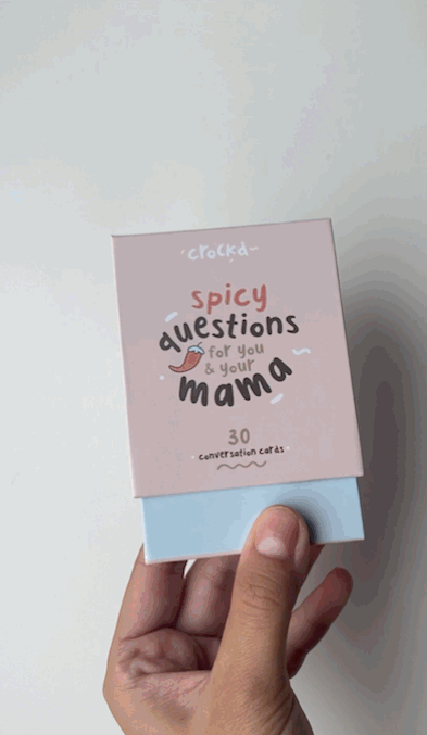 Opening and showing a few of the spicy conversation starter cards you’ll get inside this fun adult card game