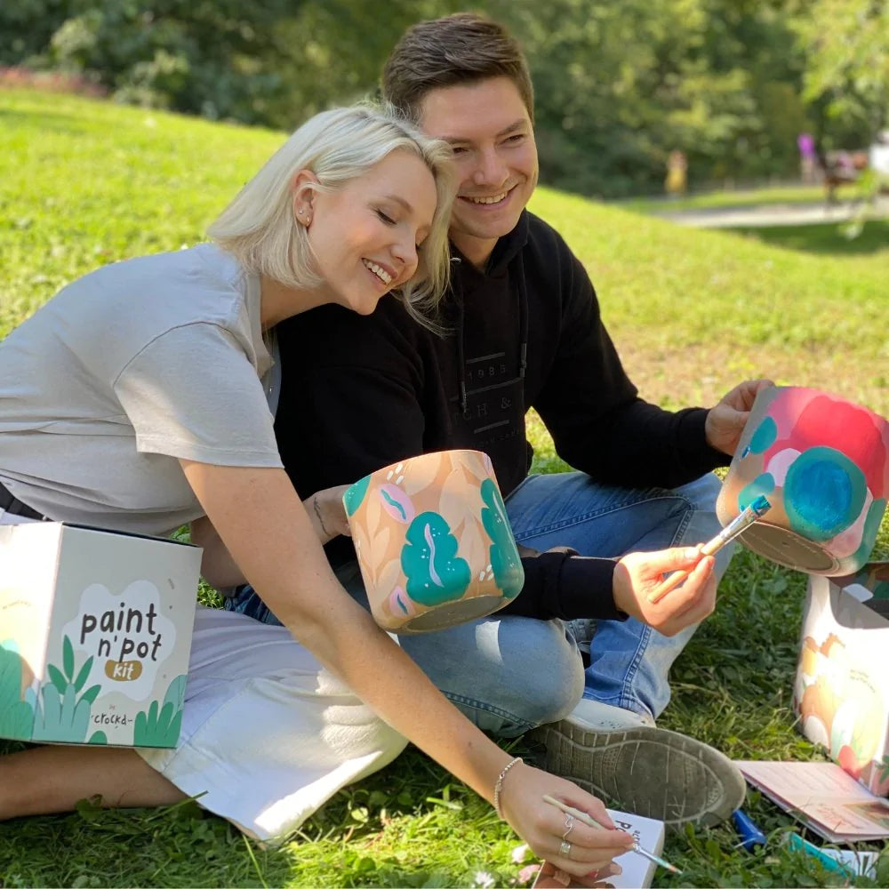 Couple pimping their planters with crockd paint
