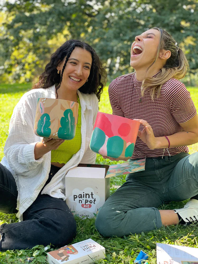 Friends enjoying painting in the park with Crockd kits